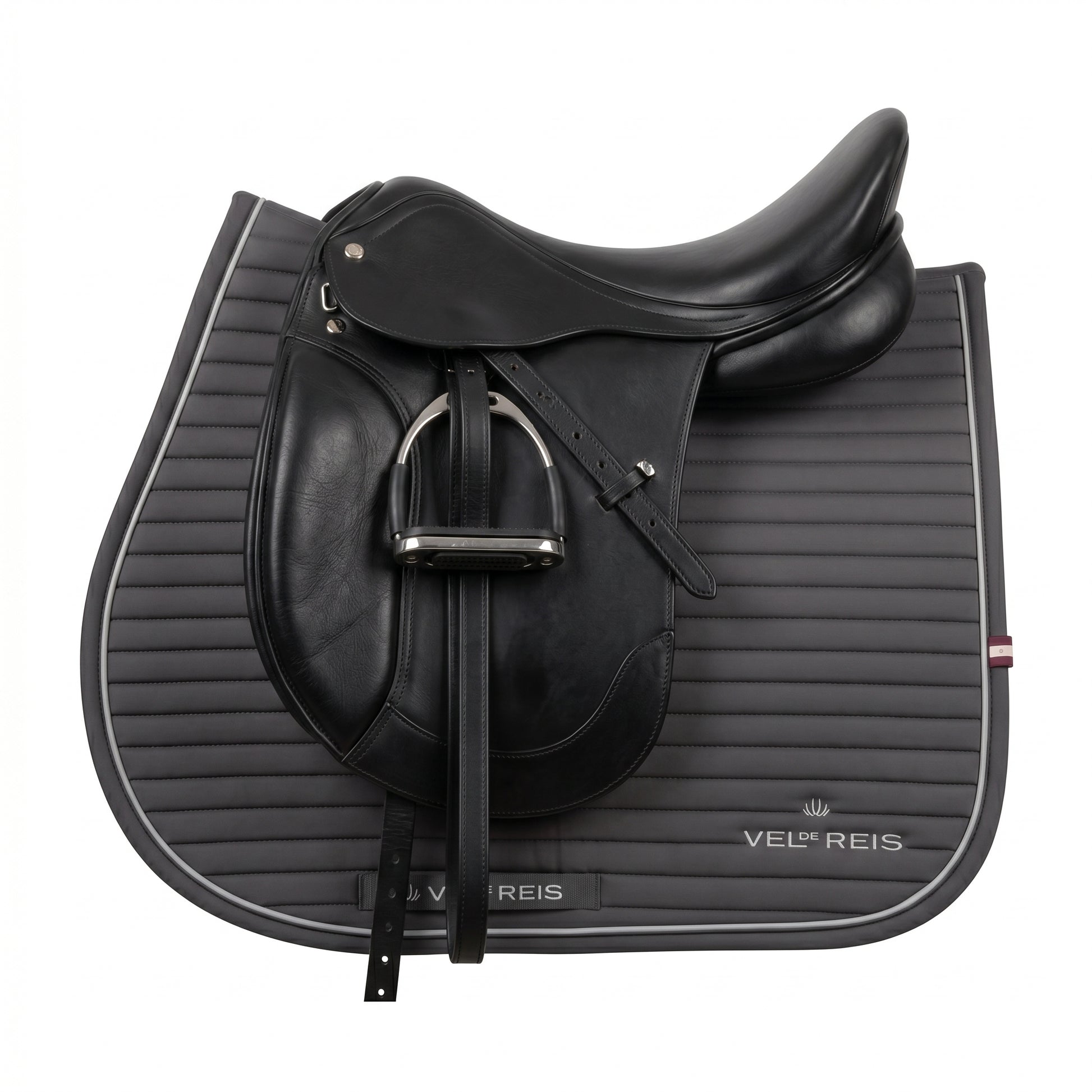 Black leather saddle with Grey saddle pad on a white background, featuring 'Vel de Reis' branding.